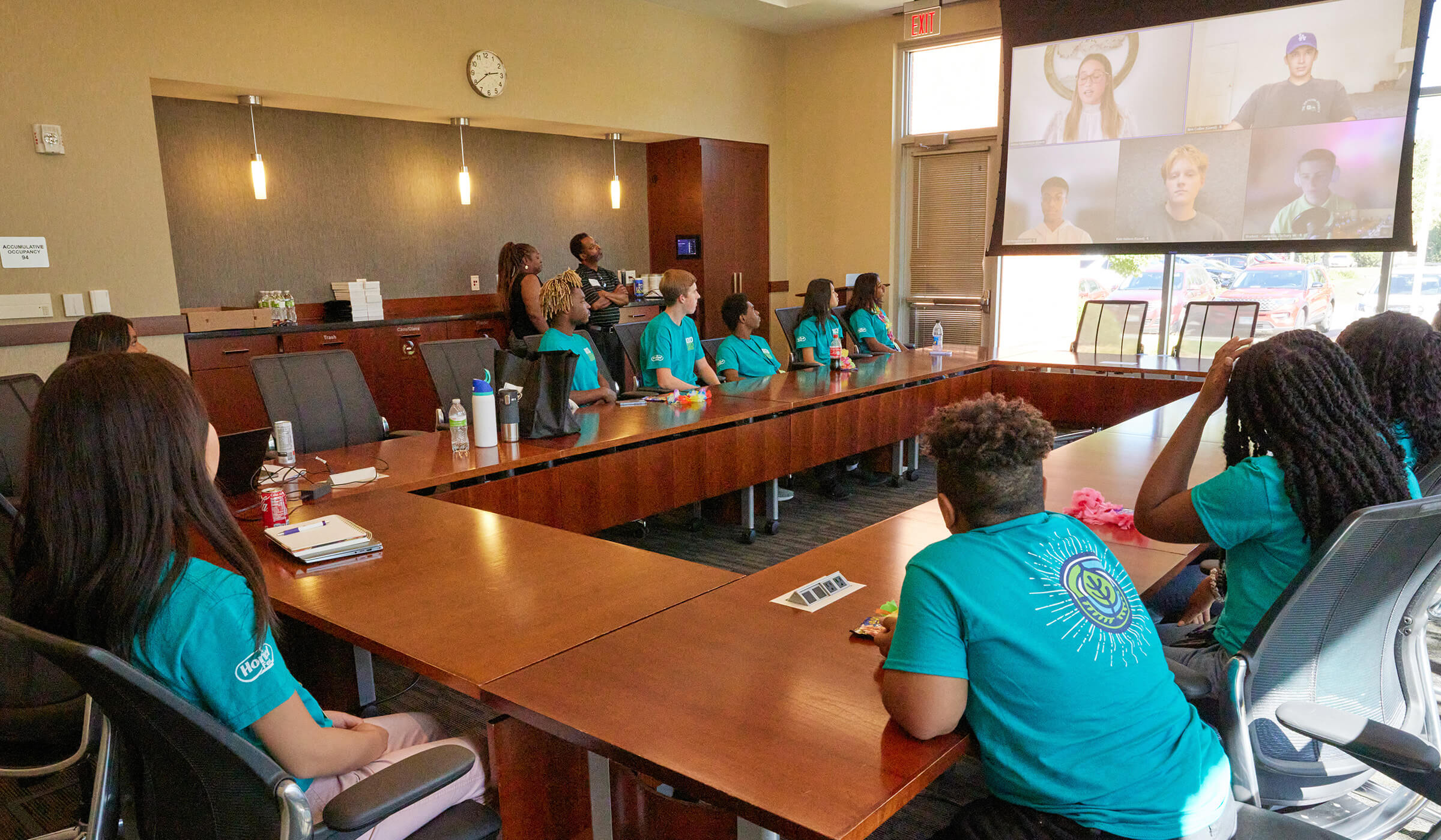 A group meeting the the 2023 10 under 20 food heroes while they were in Austin, MN to receive their awards