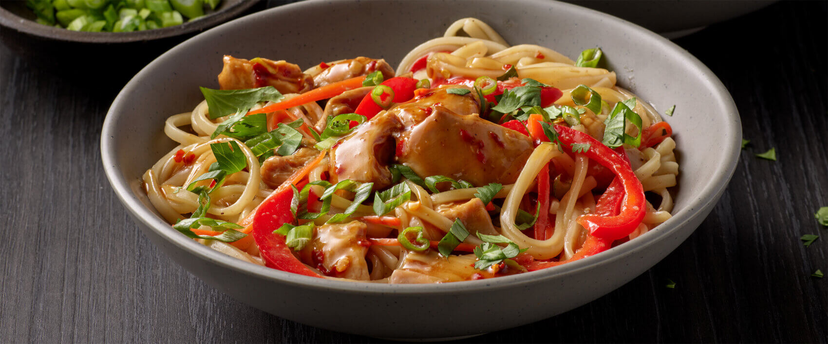 Spicy Ginger Chicken Over Pad Thai Noodles - Hormel Foods