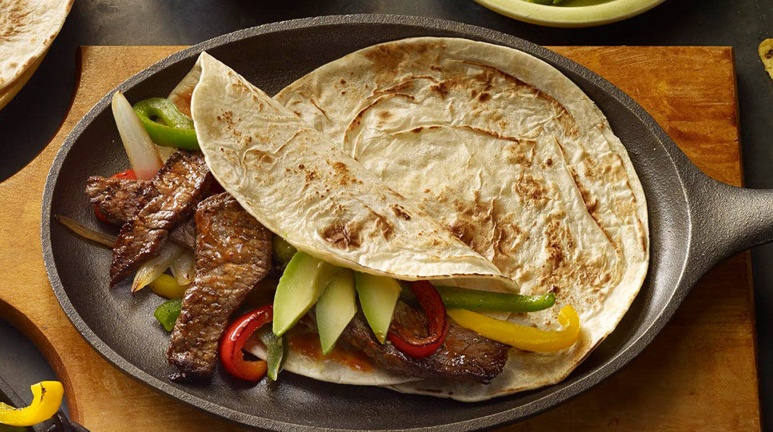 sizzling steak & avocado fajitas