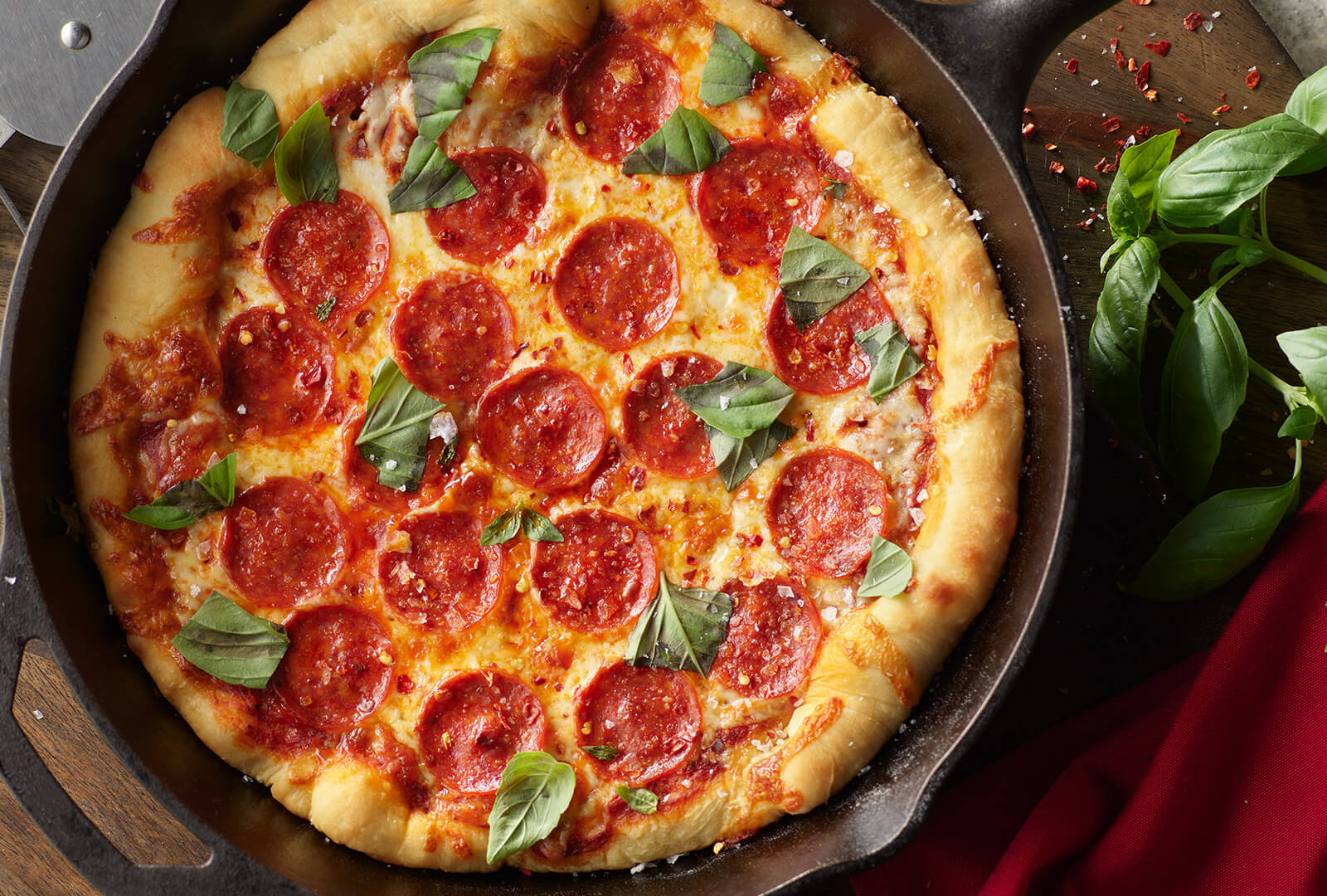 Making Pizza with the 14 inch Lodge Cast Iron Pizza Baking Pan (best pizza  crust!) 