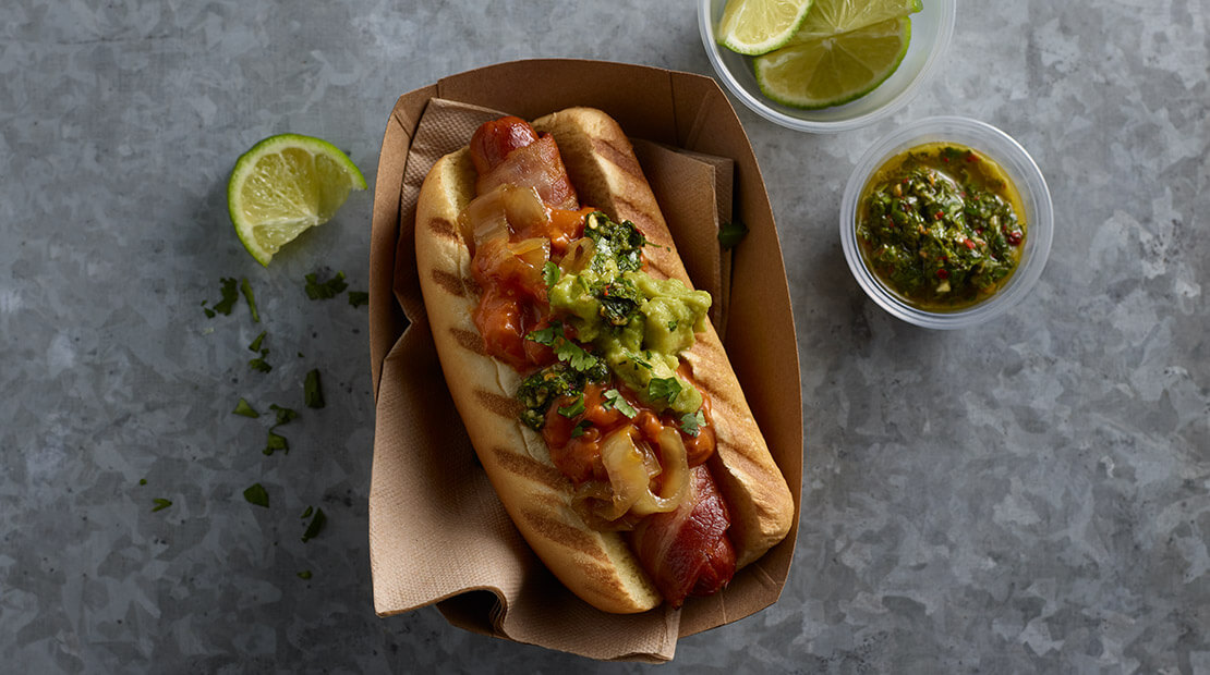 Hot Dog with chili and chimichurri sauce
