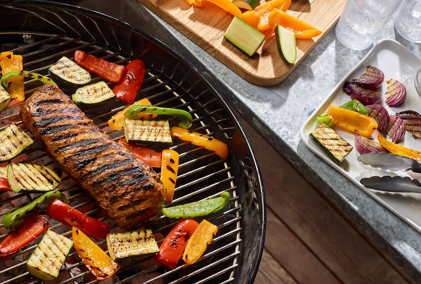 Grilled Pork Loin and vegetables on a grill