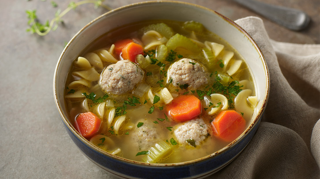 Turkey meatball soup in a ceramic bowl