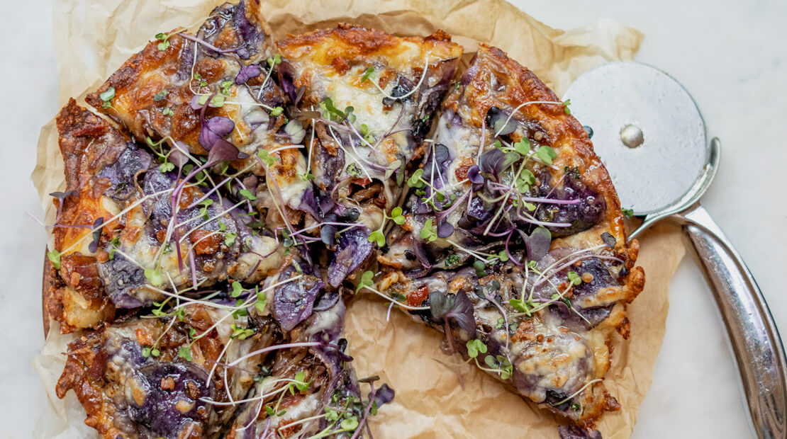 Caramelized Onion, Bacon, and Purple Potato Pizza