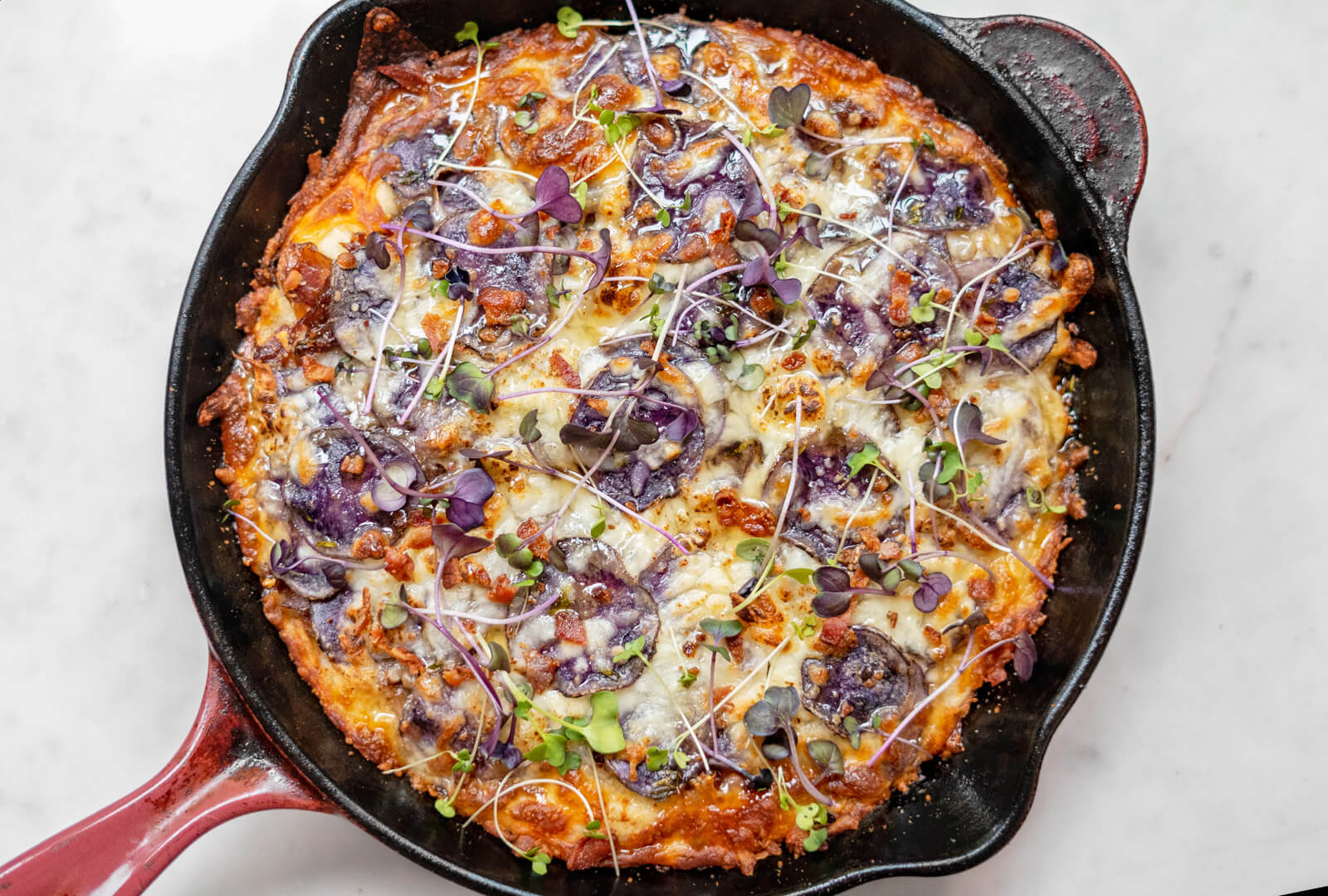 Caramelized Onion, Bacon, and Purple Potato Pizza