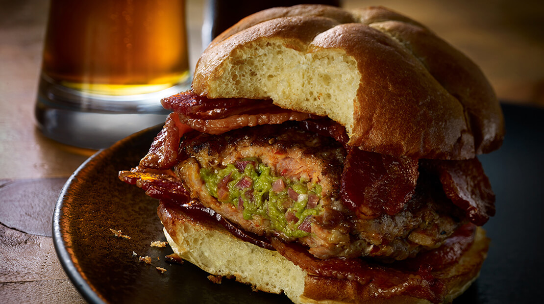 Inspired_BLB_BaconGuacamoleStuffedSausageBurgers