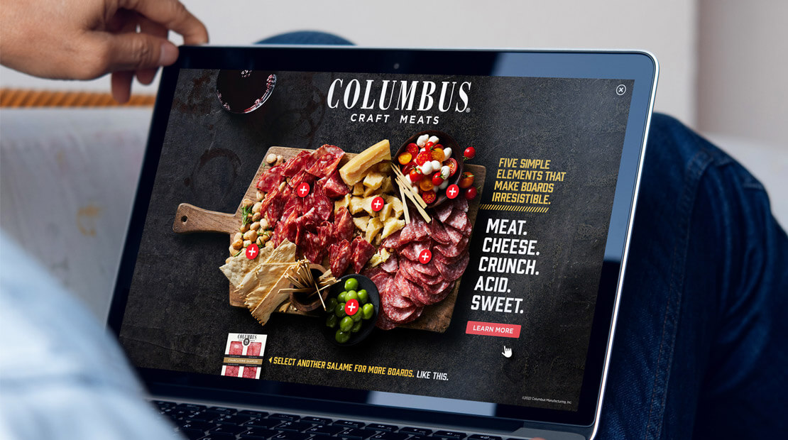 Laptop screen featuring new columbus brand campaign