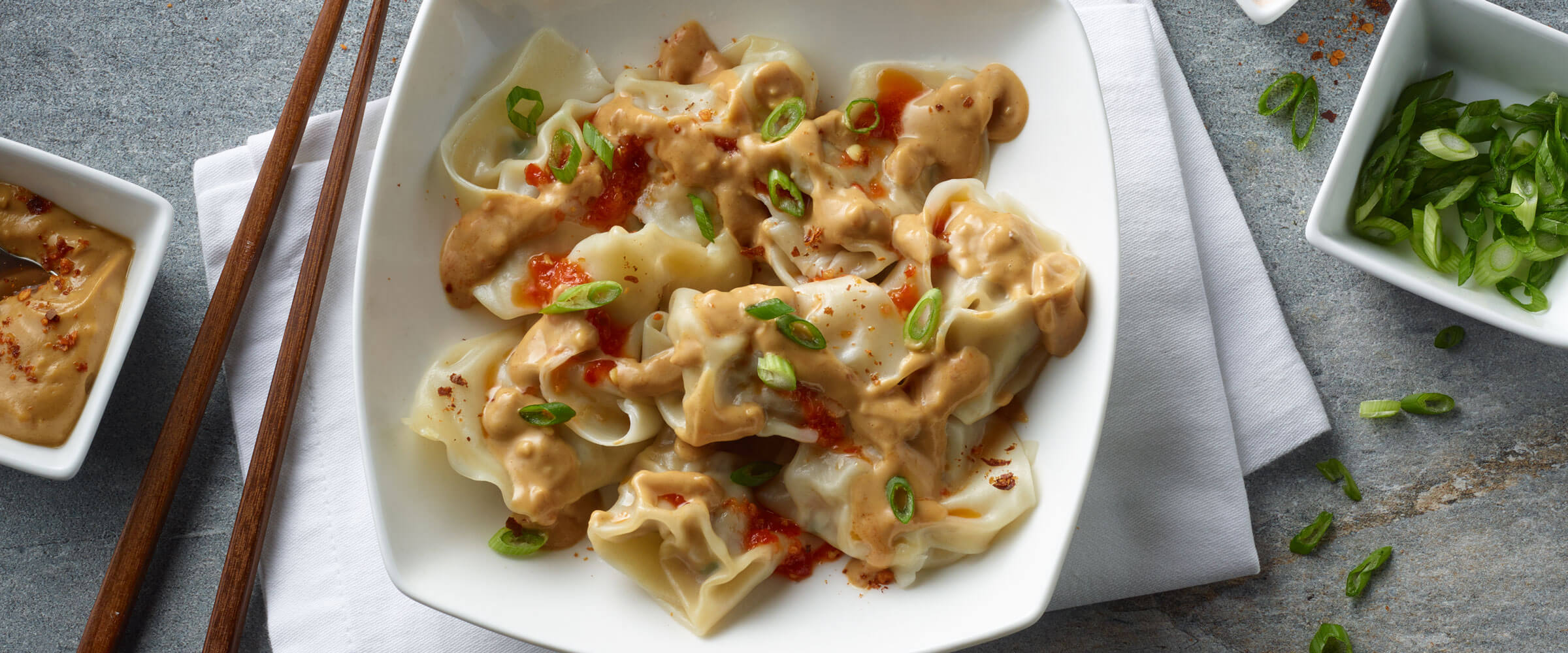 Wontons with Spicy Peanut Sauce