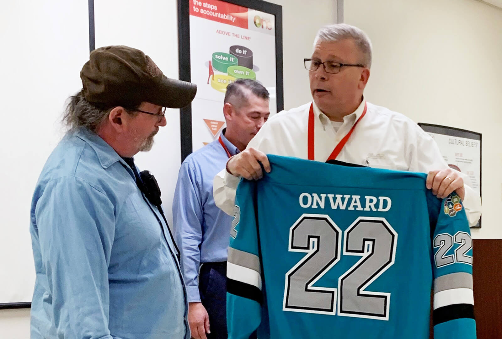 Tim Hibdon being presented with Onward '22 Jersey