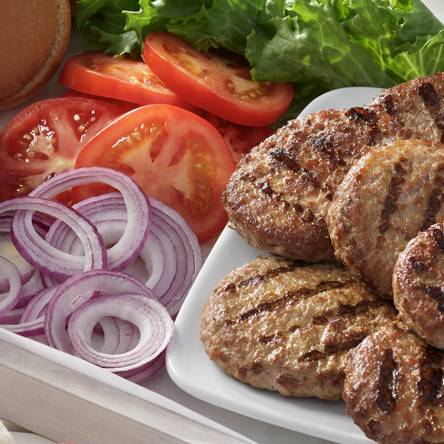 Grilled Turkey burgers with lettuce, tomato & onions