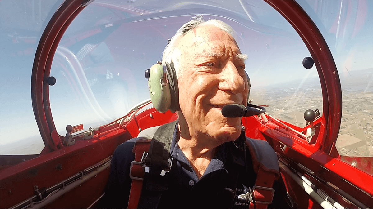 Chuck Baker flying in the same model plane he fly during World War 2 to celebrate his 100th birthday