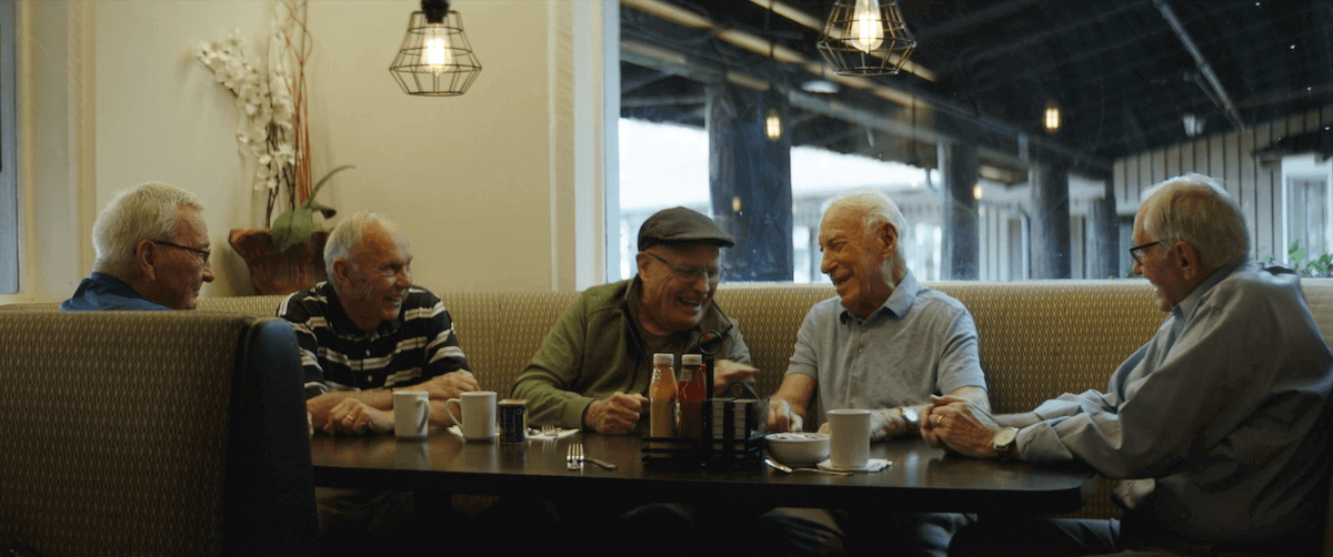 Chuck Baker and the vets around the table for lunch