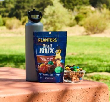 PLANTERS<sup>®</sup> Peanut Butter Chocolate Trail Mix on table
