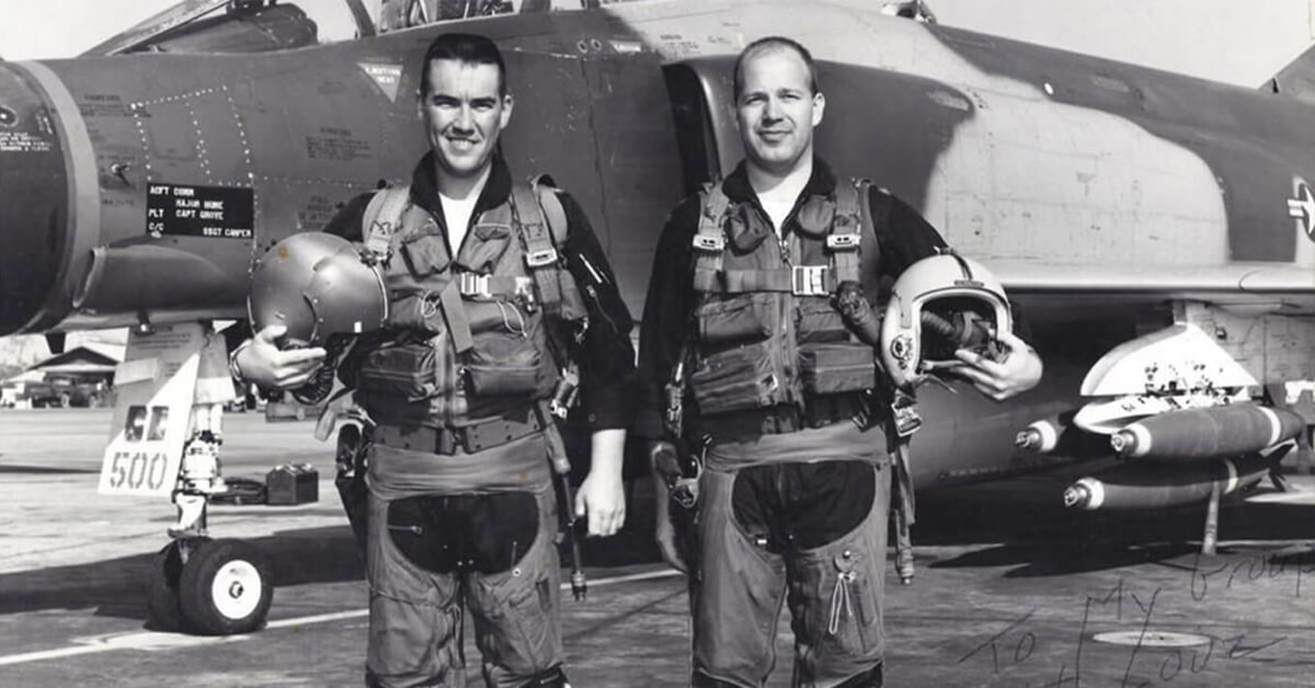 Vietnam Veteran Joe Milligan in front of a bomber