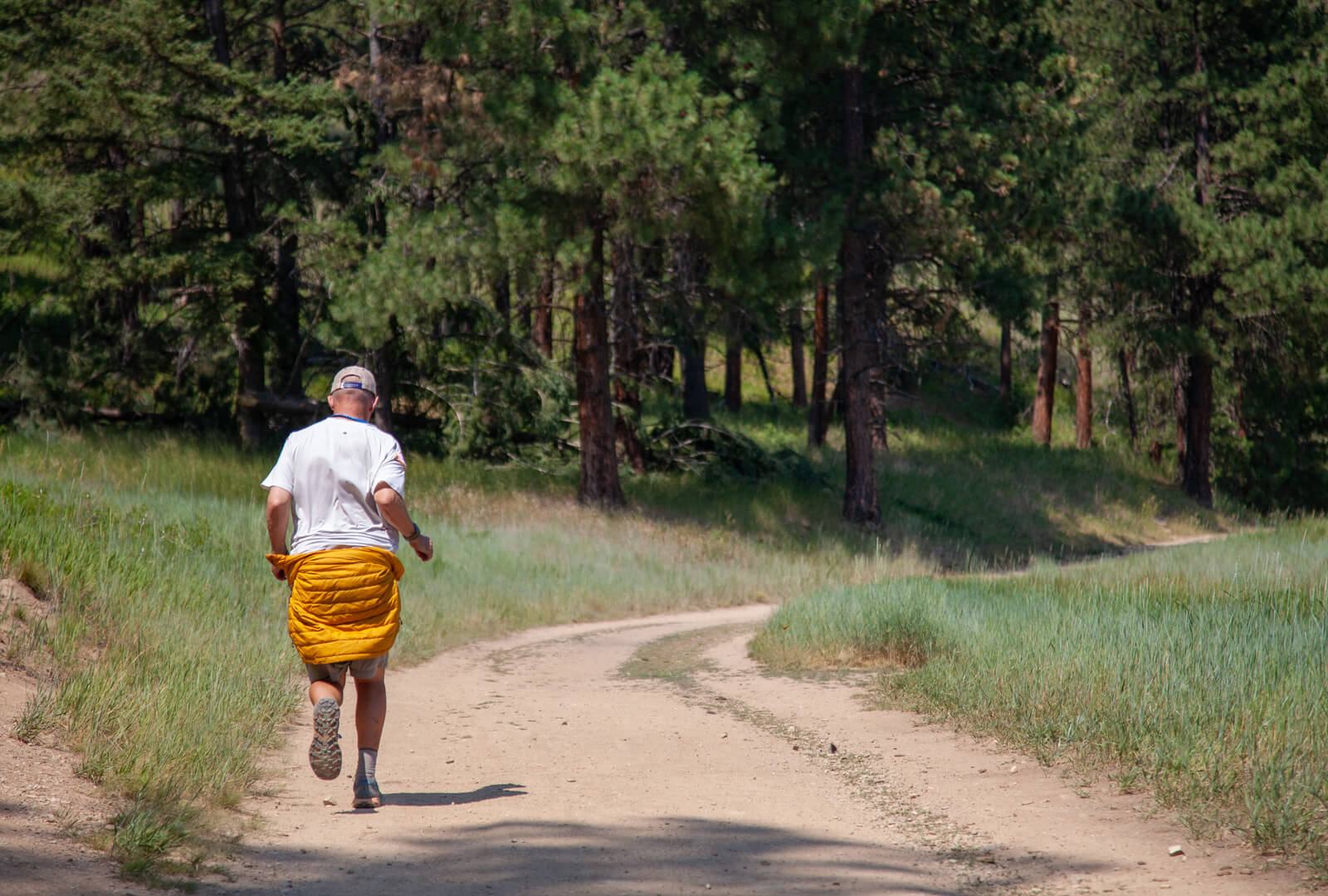 Kenneth Perry running down a path