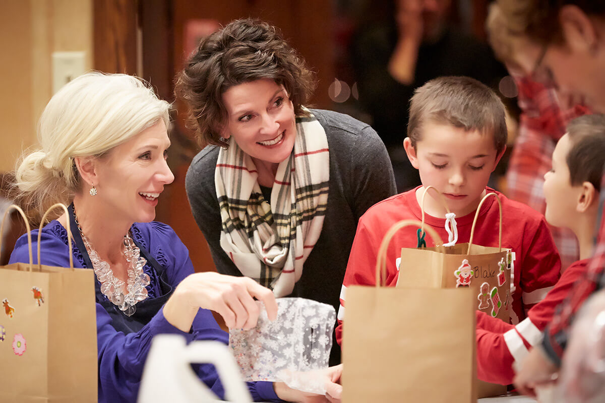 Mary Barinka and Sarah Erhert at the Hormel Historic Home Autism Holiday Party