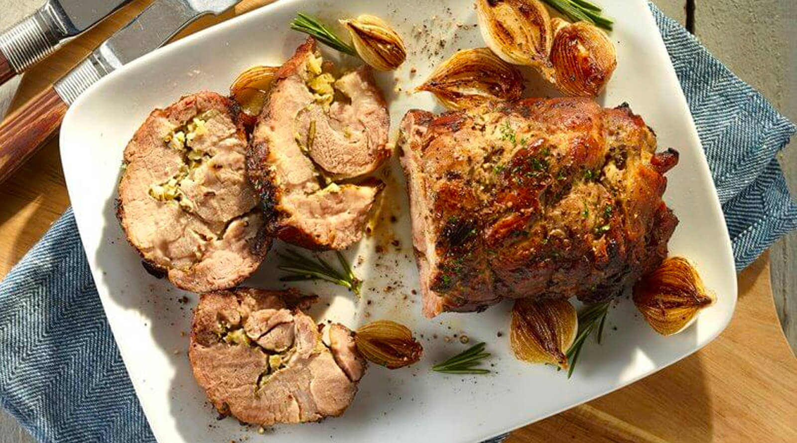 A porchetta roast served up on a platter