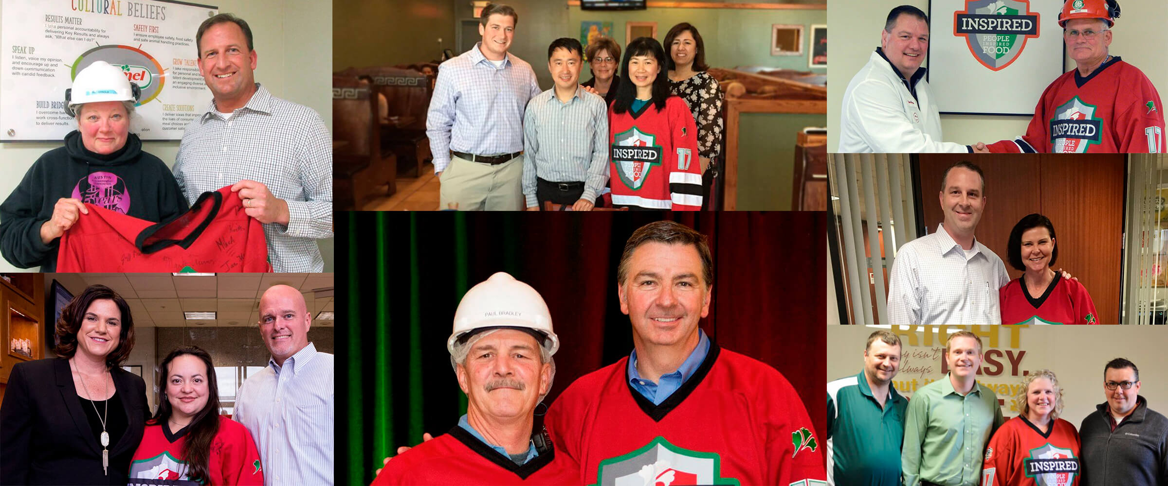 Employees wearing jersey and posing with executives