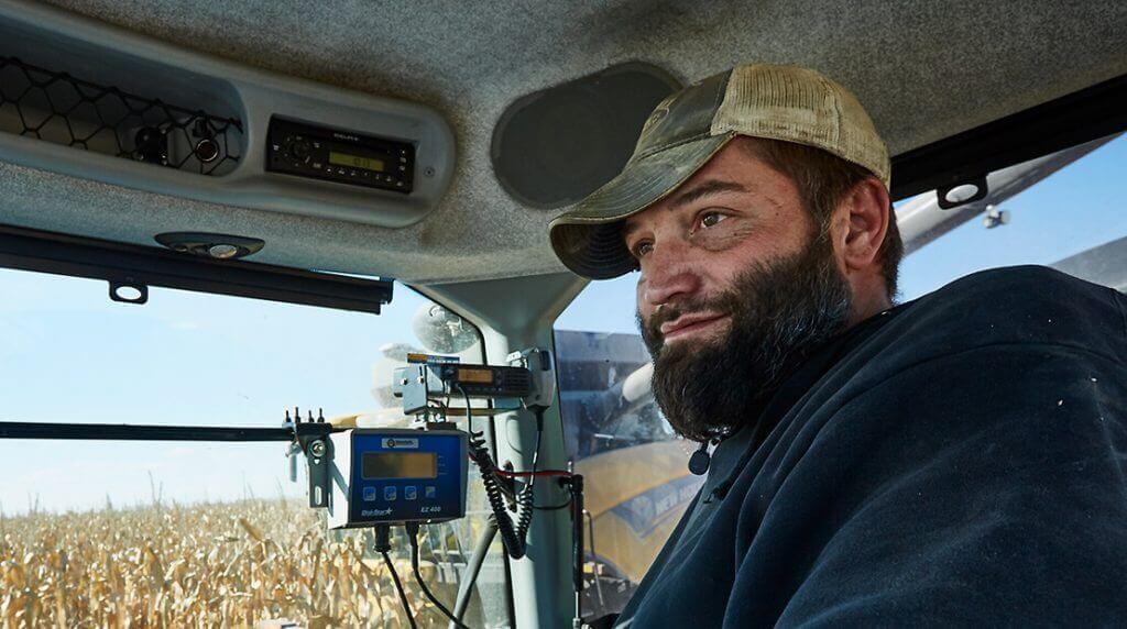 Farmer in tractor cab